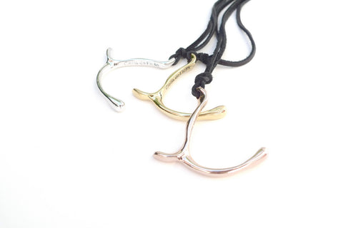 Celia de Flers wishbone large pendant on leather